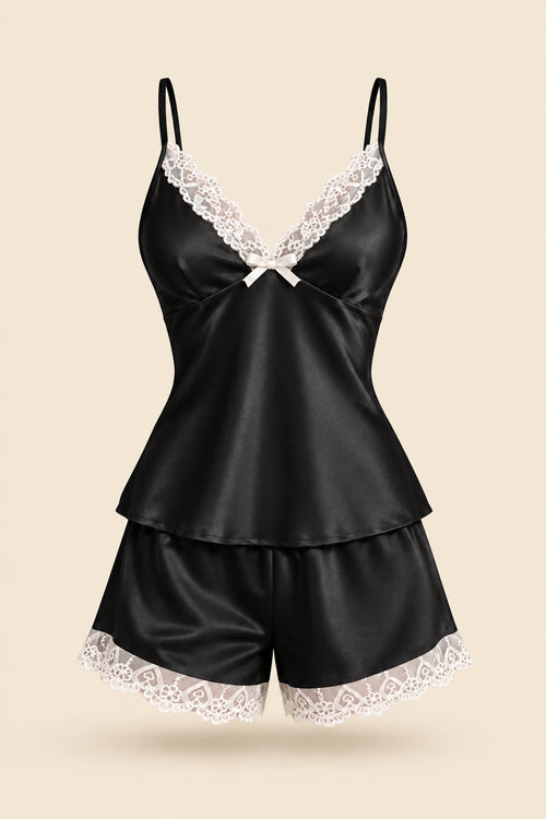 A woman models a black satin slip set with white lace trim, featuring a camisole top and matching shorts. The image includes an inset of the model wearing the set, a brand logo 'ASAAL Ladies' in the top right, and a code label 'Code 229' in the bottom right.