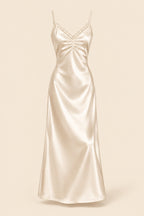 A woman models a cream satin slip dress with a matching floral print open-front cardigan featuring feathered bell sleeves, posed in an elegant indoor setting. The brand logo 'Aissaal Lingree' is visible in the top left, with a product code badge in the bottom right.