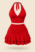 A woman modeling a bright red two-piece halter crop top and matching ruffled mini skirt, shown in front and back views. The image has a pink 'Divi shop' logo at the top and contact details at the bottom.