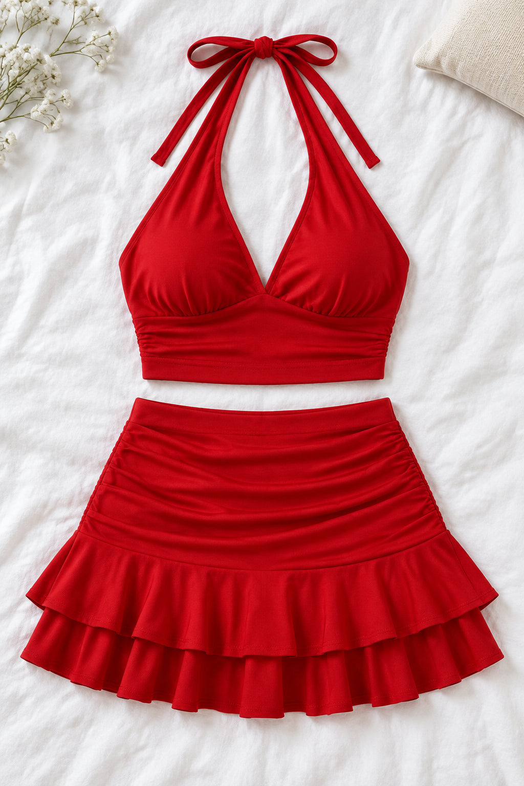 A woman modeling a bright red two-piece halter crop top and matching ruffled mini skirt, shown in front and back views. The image has a pink 'Divi shop' logo at the top and contact details at the bottom.