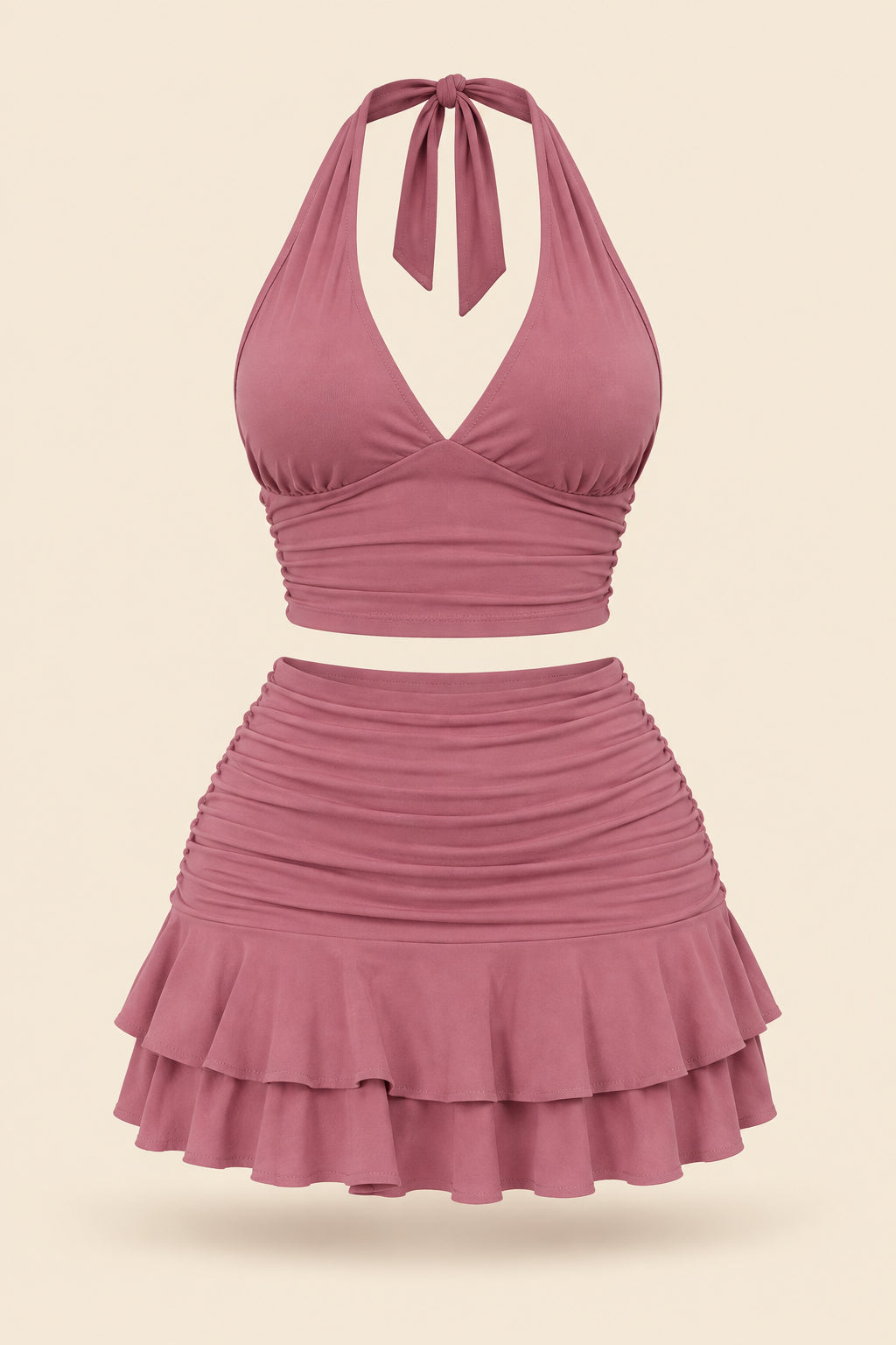 A woman modeling a dusty rose halter crop top and matching ruffled mini skirt, shown in front and back views side by side. The image includes a 'Diaa shop' logo at the top, a phone number at the bottom left, and a code at the bottom right.
