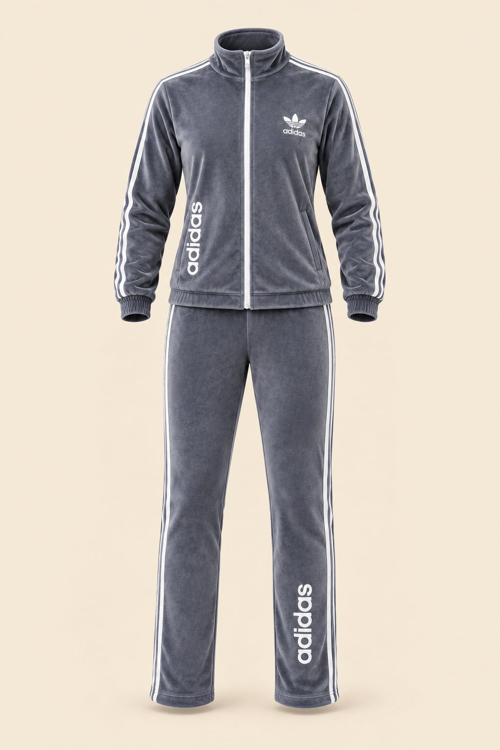 A woman modeling a gray Adidas tracksuit consisting of a zip-up jacket and matching pants, with white Adidas logos on the chest and down the sides. The image has a 'Magic Queen' watermark in the top left, a phone number on the right, and a model badge at the bottom.