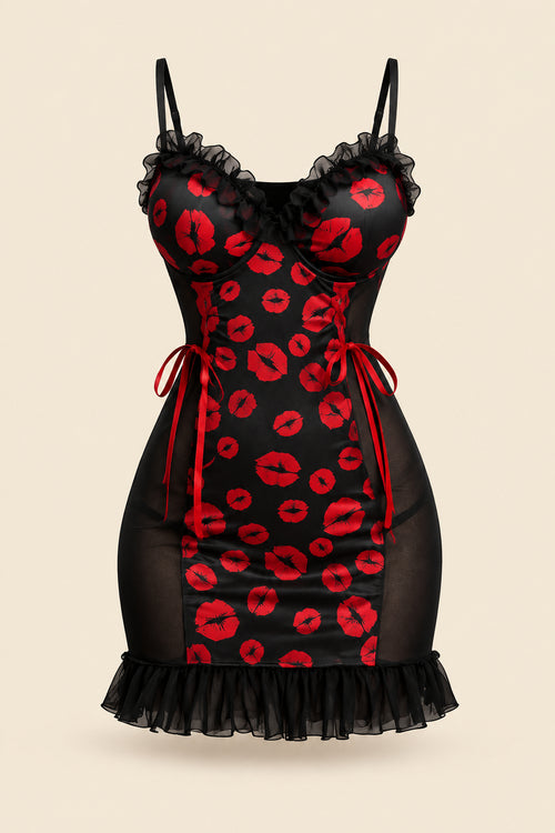 A woman models a black mini dress with red lip print and sheer mesh panels in a warmly lit bedroom setting. Two smaller inset views on the right show the dress from different angles, and text overlays include 'JOY ENA Lingerie', 'Size Free Size Model 1342', and promotional copy.