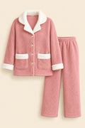 A pink fleece pajama set with white sherpa lining, including a long-sleeve button-front top and matching pants, displayed on a white background with a small cup prop and a visible HL logo in the top left.