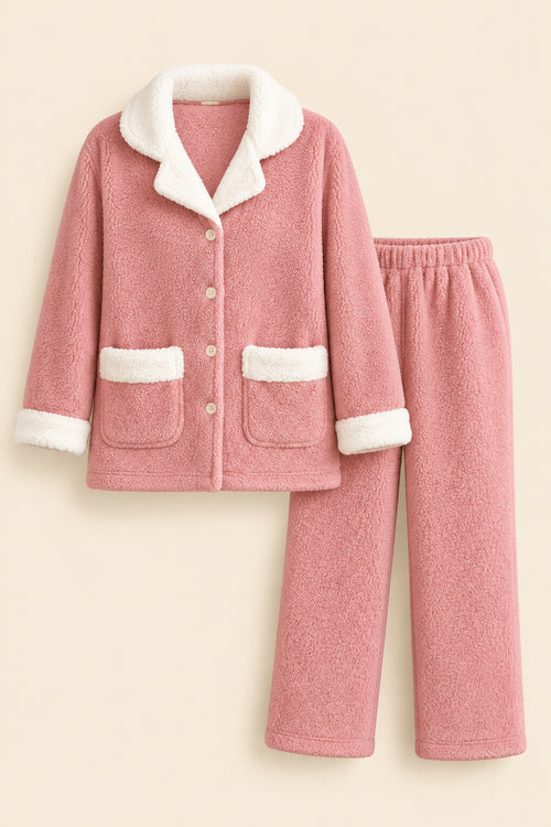 A pink fleece pajama set with white sherpa lining, including a long-sleeve button-front top and matching pants, displayed on a white background with a small cup prop and a visible HL logo in the top left.